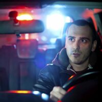Male Driver Getting Pulled Over By The Police Stock Photo