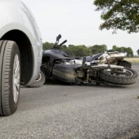 Motorcycle Collision With Car Stock Photo