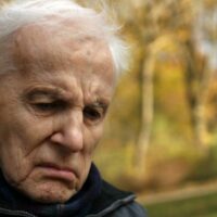 Elderly Man Frowning Stock Photo
