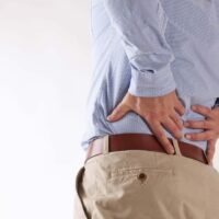 Lower Back Pain Stock Photo | Personal Injury Lawsuit | Nashville