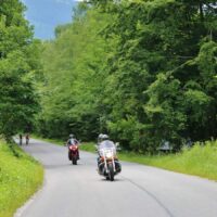 Motorcycle Riders Rural Road Stock Photo